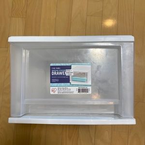 Storage drawer, has working shelf.